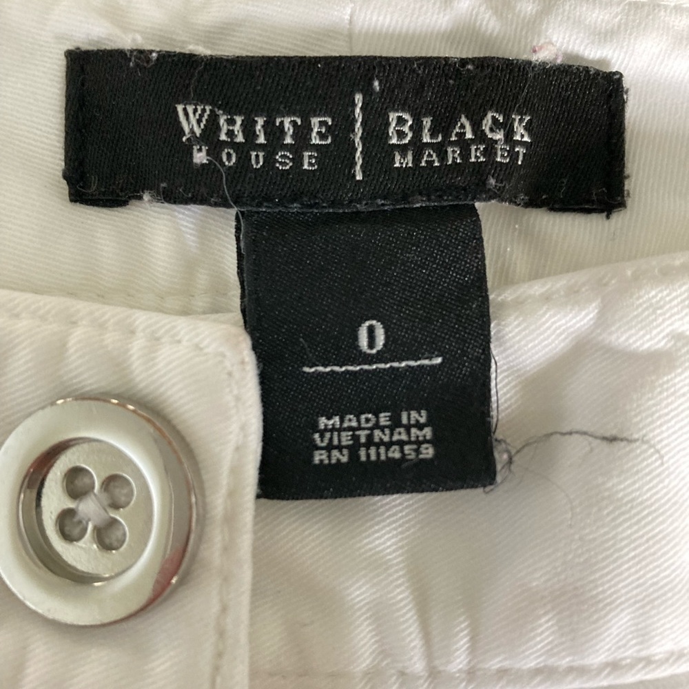 White House Black Market white cotton long capris with button pockets, size 0